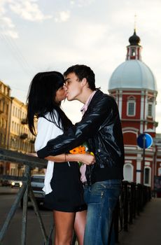 Kissing Couple spending time on date summer park