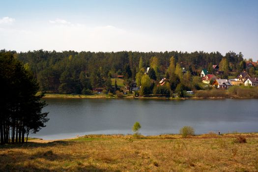 Landscape over the lake and village
