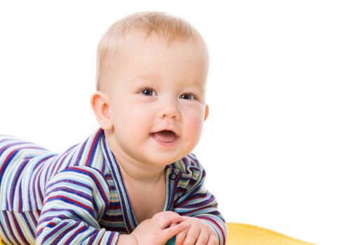 Happy Baby lying on towel isolated on white