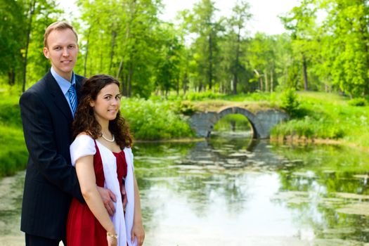 Happy young couple spending time together outdoors