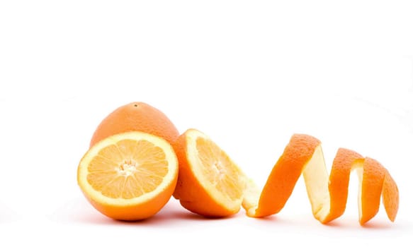 Fruits of orange wich peels, Isolated on white background. Close-up. Studio photography.