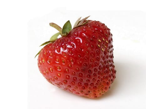 Fresh wet strawberry, isolated on a whit background