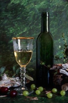 White wine with fruits on painted background