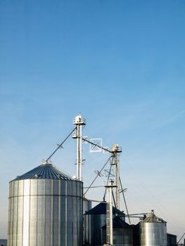 Modern farmer silos factory in open fields