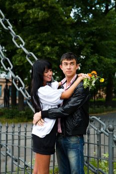 Young Couple spending time on date summer park