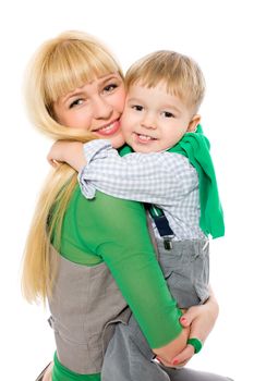 Boy hugging mom tight isolated on white