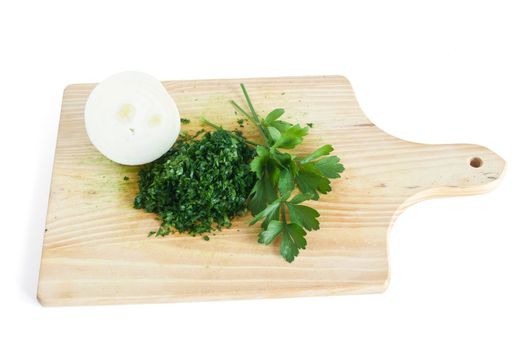 chopping board with onion and parsley isolated on white background with clipping path