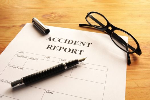 accident report form or document showing insurance concept