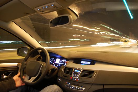 speed car at night in motion with traffic