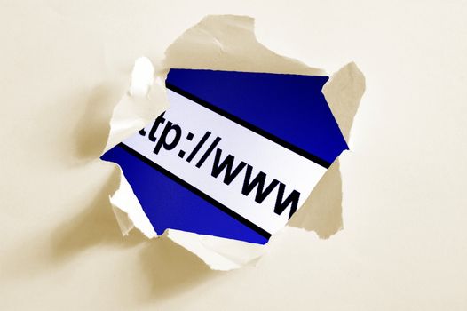 internet concept behind hole in blank paper