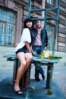 Happy young couple spending time together outdoors