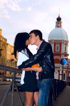 Happy young couple spending time together outdoors