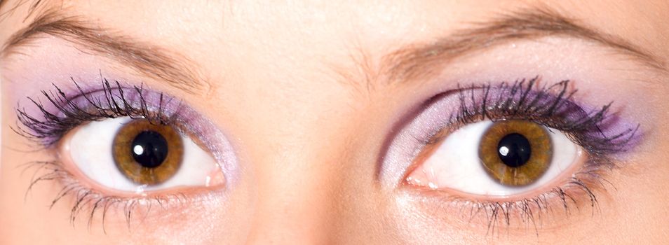 Close-up of Beautiful brown eyes of young girl