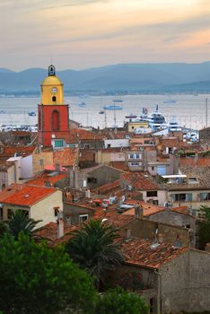 View at St.Tropez and anchored ships at sunset in French Riviera