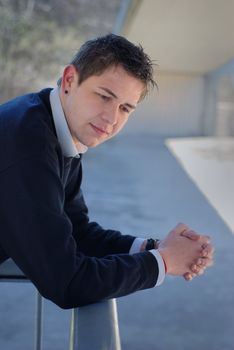 outdoor portrait of smart and young businessman