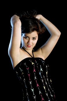 Portrait of a beautiful young and attractive woman on a black background