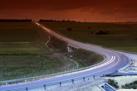 lihgttracks over the highway by night