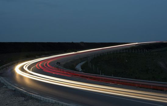 lihgttracks over the highway by night