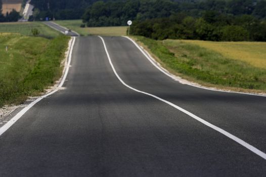 White signs on the middle of the road 