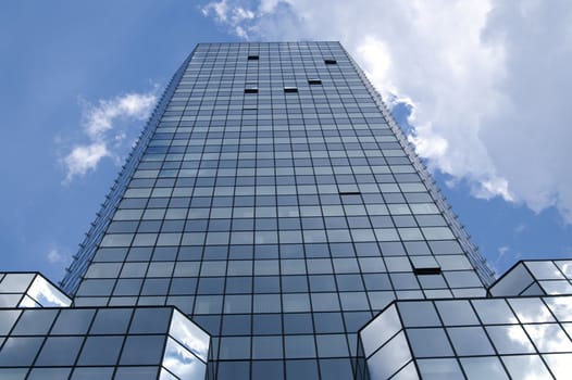 Glass house building against sky, Bank square