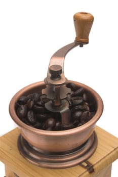 Coffee mill and coffee beans,over white