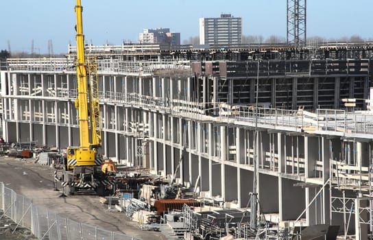 Construction site for houses with a crane