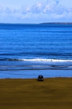 car on beach left unattended