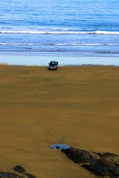 car on beach left unattended