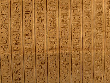 Close up shot of hieroglyphics on an Egyptian monument.