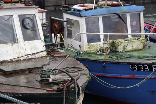 two old trawlers moored up