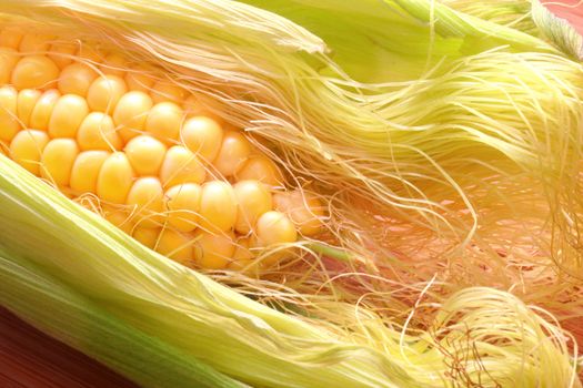 Corn on the cob with silk.