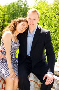 Happy young couple spending time together outdoors