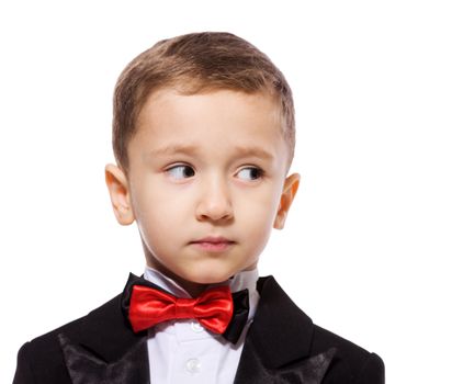 Little Boy wearing tuxedo portrait isolated on white