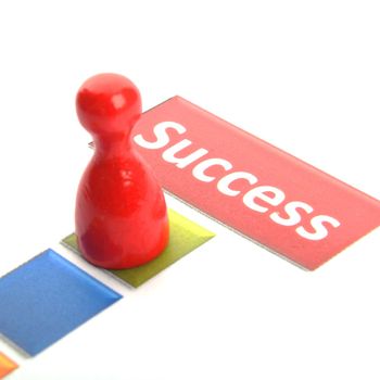 success win or winner business concept with pawn and word