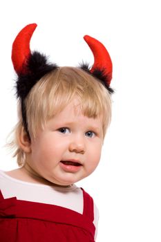 Portrait of little girl wearing devil's horns isolated
