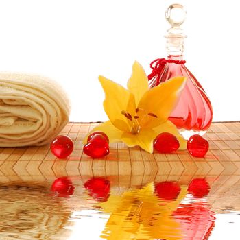 spa still life and water reflection showing wellness concept