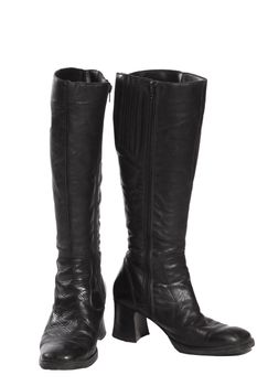 Black beautiful leather modern boots isolated on white