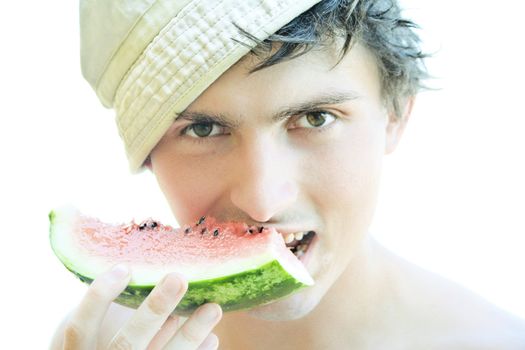 young boy with a slice of watermelon