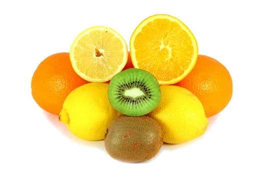 Citrus fruits and kiwi isolated on white background