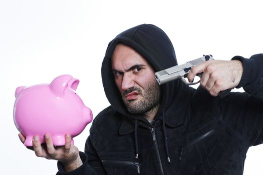 man with gun and pink piggy bank