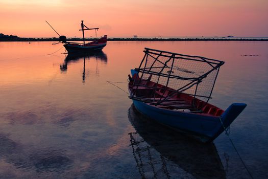 Boats on beautiful sunset in Thailand Asia