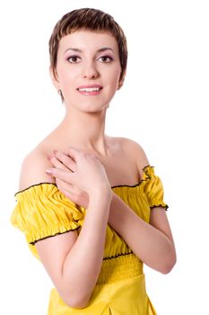 beautiful young woman wearing yellow dress isolated on white