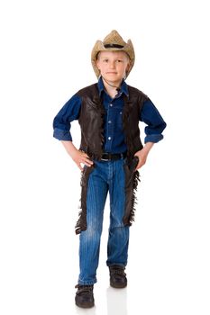 The boy wearing clothes of cowboy isolated on white