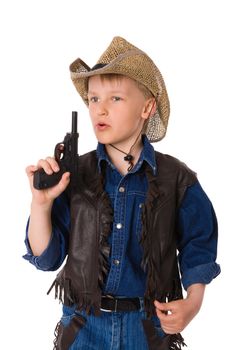 The boy wearing clothes of cowboy isolated on white