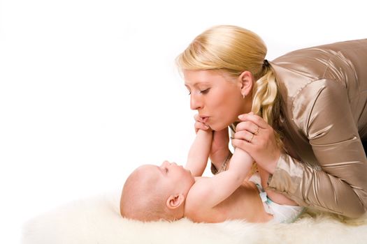 Mother with baby happy together isolated on white