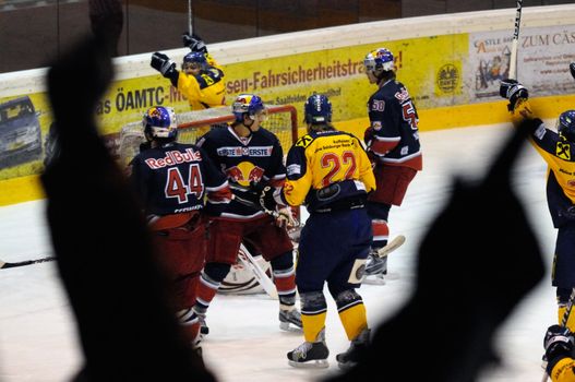 ZELL AM SEE, AUSTRIA - DECEMBER 7: Austrian National League. Zell am See scores the first goal of the game. Game EK Zell am See vs. Red Bulls Salzburg (Result 4-6) on December 7, 2010, at hockey rink of Zell am See