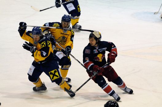 ZELL AM SEE, AUSTRIA - DECEMBER 7: Austrian National League. Patrick Maier gets hit in the face. Game EK Zell am See vs. Red Bulls Salzburg (Result 4-6) on December 7, 2010, at hockey rink of Zell am See