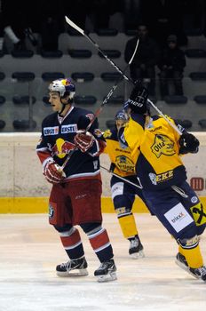 ZELL AM SEE, AUSTRIA - DECEMBER 7: Austrian National League. Players high sticking. Game EK Zell am See vs. Red Bulls Salzburg (Result 4-6) on December 7, 2010, at hockey rink of Zell am See