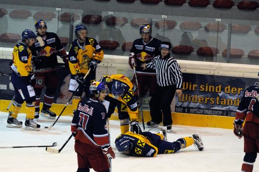 ZELL AM SEE, AUSTRIA - DECEMBER 7: Austrian National League. Zell am See player Barton injured. Game EK Zell am See vs. Red Bulls Salzburg (Result 4-6) on December 7, 2010, at hockey rink of Zell am See