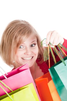 Beautiful woman with shopping bags isolated onwhite